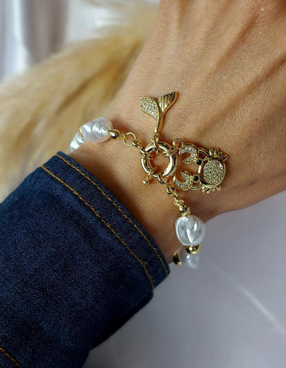 Pulseras en baño de oro 18 quilates y perlas cultivadas. Colección Marina